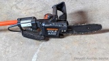 Remington telescopic electric pole saw is in good condition with one hose clamp.