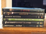 DVDs including Batman Collection, Batman & Robin, Iron Man 2, Batman Returns, Godzilla, Thor.