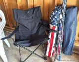 Four folding bag chairs in good shape; three hockey sticks by Easton, Bauer and other.