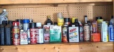 Full and partial containers of motor oil, ATF, fogging oil, Brasso, TSP-PF, Oops, foam filter
