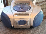 Portable radio with cassette deck is good for the garage.