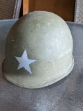 US military metal helmet with chin strap, but no liner.
