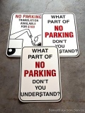 Three No Parking signs are each 18