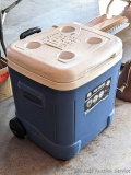 Igloo Ice Cube cooler with wheels and extendable handle. Measures 17