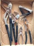 Huge slip joint pliers, and a few smaller pairs, largest measure 16