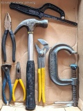 Claw hammer, a few pairs of pliers, a C clamp, more.