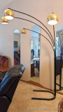 Four light floor lamp stands approx. 7' tall and is approx. 5-1/2' at widest.