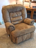 Rocker recliner is clean and in good condition. Comfortable chair rocks and reclines as it should.