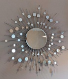 Classic sunburst pattern wall mirror is approx. 38