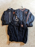 Marshfield Tigers jacket is size M; Marshfield Football windbreaker is size XXL; Marshfield Tigers