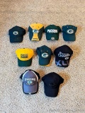 Green Bay Packer hats - all different styles, most near-new.
