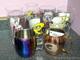 Green Bay Packers, Wisconsin Badgers, Chicago Cubs glasses, plus a Packers Moscow Mule cup, more.
