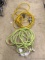 Lime green 12 gauge extension cord, 12 gauge 1-3 splitter cord, and yellow 12 gauge 1-3 extension