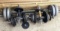Cast iron and other free weights, plus dumb bell bars and a bench press bar.