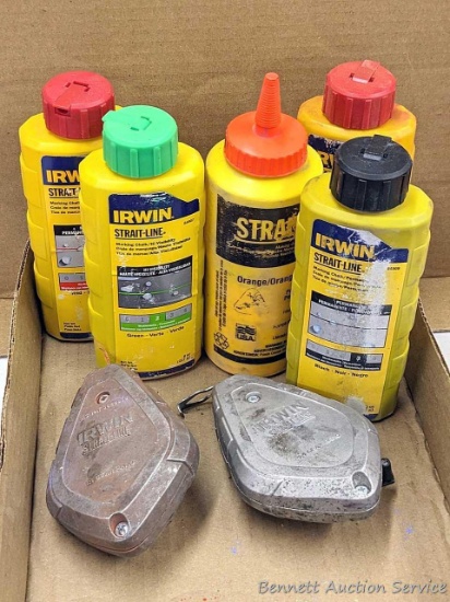 Two Irwin chalk lines and four colors of line chalk partially full.