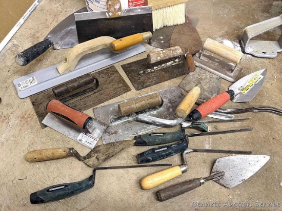 Masonry tools by Marshalltown, Goldblatt, and others including 16" float, 10" and smaller trowels,