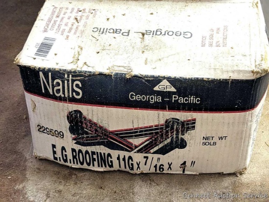 Most or all of a 50 lb box Georgia Pacific 7/16" x 1" galvanized roofing nails.