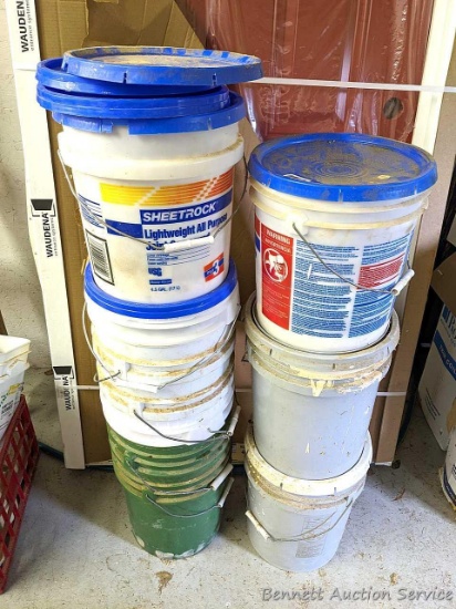 Two stacks of buckets are each 42" tall.