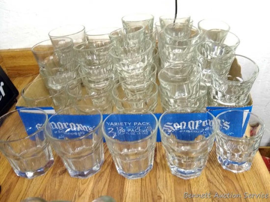 Collection of whiskey glasses are around 3" and 3-1/2" tall.