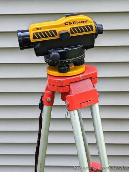 CST / Berger sight level with tripod and 8' range pole. Optics are clear, focus works. Micro-adjust