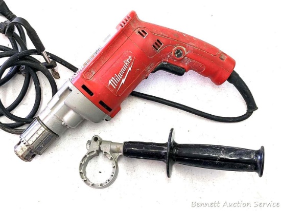 Milwaukee Heavy Duty 1/2" Drill with cord. Includes tool handle and attached chuck.