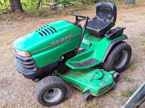 Sabre lawn tractor by John Deere with 54" deck is powered by a Briggs 22 hp Vanguard engine. Fires
