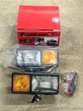 Peterson 505K snowplow light kit. One appears used and repaired, other appears new in package.