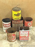Vintage one gallon cans including Pennzoil, Zero King, Dur-A-Lub, Shell X-100, Kendall and Texaco.