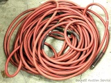 At least three contractor grade air hoses. Coils are 24