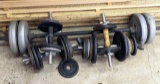 Cast iron and other free weights, plus dumb bell bars and a bench press bar.