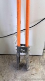 Post hole digger with fiberglass handles is 5' tall.