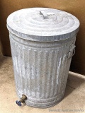 2 foot tall galvanized bucket with a bottom drain, great beverage ice bucket for parties next