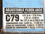 Pair of Akron C-79 adjustable floor jacks.