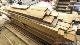 Hardwood including cherry, red oak, butternut?, plus some pine and trim stock. Longest pieces 14',