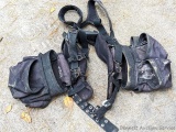 Dead on roofing, framing or carpentry tool bags and harness, appears to be in good used condition.