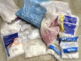 Quantity of partial bags of tile spacers.