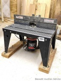 Craftsman 1-1/2 hp router with appropriate Craftsman table measuring about 18