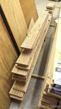 Stack of end match hardwood flooring includes cherry, white ash, red oak, and what I believe to be