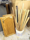 Four cabinet doors and a bucket of 2
