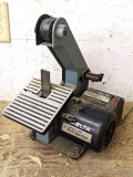 Delta model 31-050 belt sander with a 1/4 hp motor. The sander appears to be in good condition, just