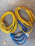 3 Extension cords, one needs to be repaired. Each cord is estimated to be 25 ft long and are heavy