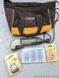 Rockwell SoniCrafter trim saw in bag and includes a variety of blades. Some blades appear to be