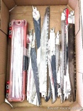 New and used Milwaukee reciprocating saw blades, mostly demolition blades.