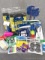Household supplies incl chargers, cleaning sponges and scrubbers, foldable laundry hamper, hand pump