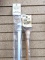 Set of 2 flag poles for your home. One is wooden and one is aluminum, both measure nearly 5 ft tall.