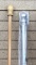 5ft Aluminum flag pole and 5ft Wooden flag pole. Both appear to be new and unused.