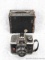 Antique box camera is marked 'Eastman Kodak Co. No 2A Brownie' and a newer vintage Ansco ReadyFlash