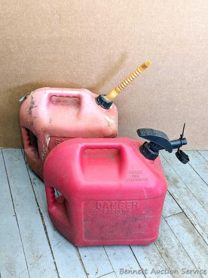 Pickup in Rib Lake. Pair of 5 gallon gasoline totes with pour spouts.