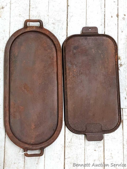 Pickup in Rib Lake. Two cast iron griddles need a good cleaning and seasoning. Larger is 23"