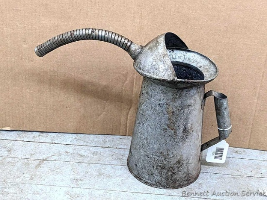Pickup in Rib Lake. Galvanized four quart oil or other automotive dispenser.